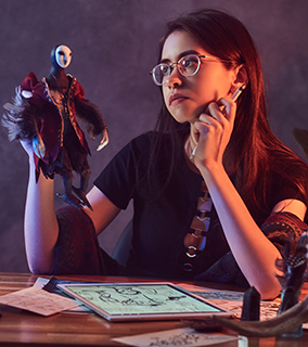 portrait of cute designer girl at workshop