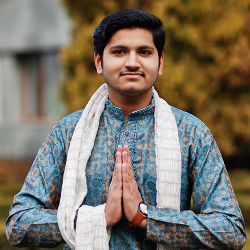 indian man wear on traditional clothes with white scarf posed ou